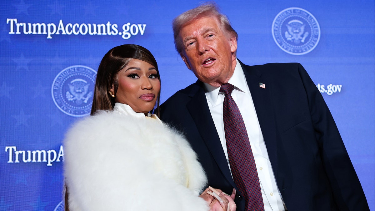 Nicki Minaj on stage with Donald Trump