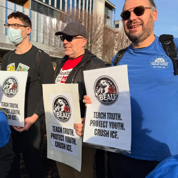 OEA union members held signs at the Jan. 31 protest calling on other teacher to “Crush ICE.”