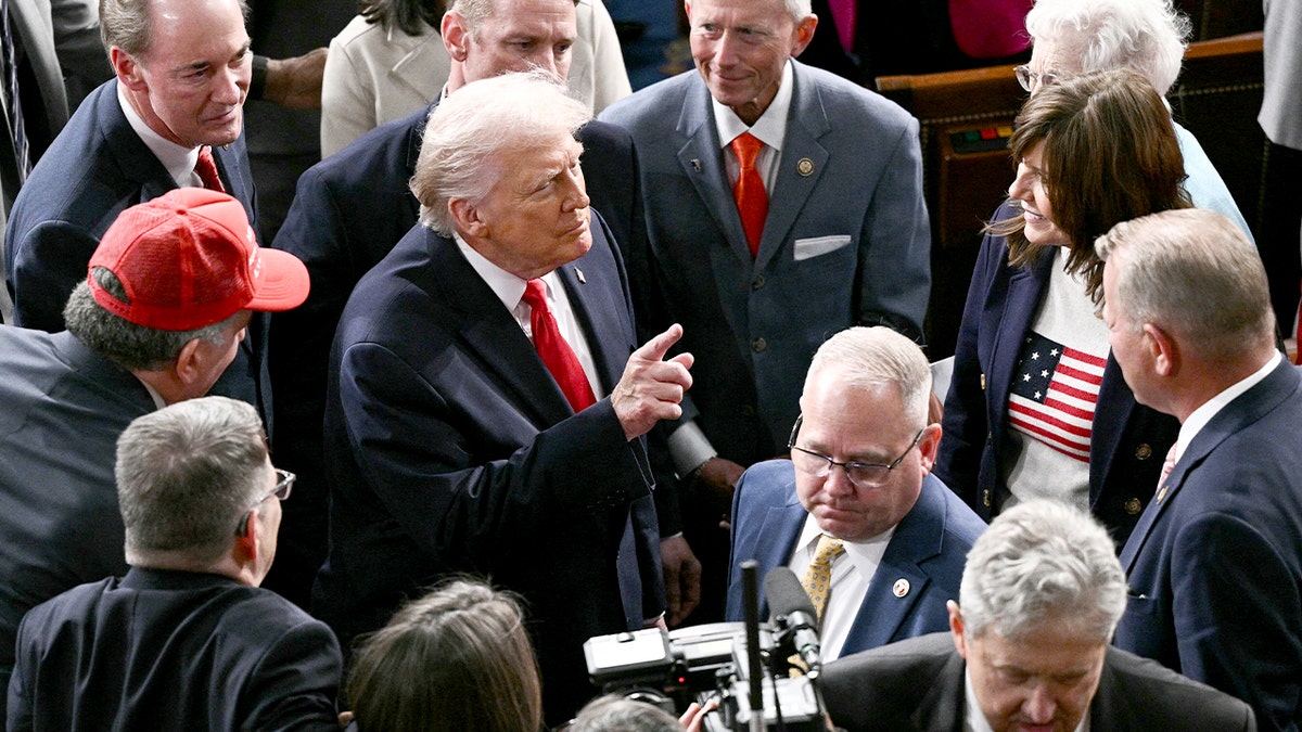 President Donald Trump exits the House Chamber after addressing a joint session of Congress at the US Capitol.