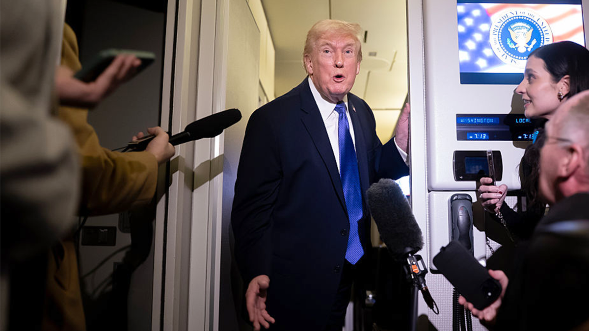 President Donald Trump speaks to members of the media