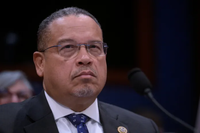 Minnesota Attorney General Keith Ellison listens during a House Committee on Oversight and Government Reform hearing on oversight of fraud and misuse of Federal funds in Minnesota.