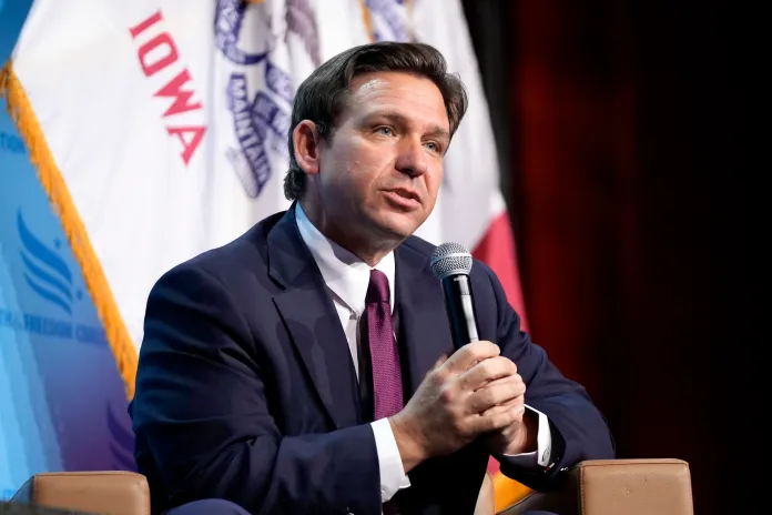 FILE - Republican presidential candidate Florida Gov. Ron DeSantis speaks at the Iowa Faith & Freedom Coalition's fall banquet, Saturday, Sept. 16, 2023, in Des Moines, Iowa. DeSantis' team this week announced it was moving roughly 20 of his Florida-based national campaign staff to Iowa. (AP Photo/Bryon Houlgrave, File)