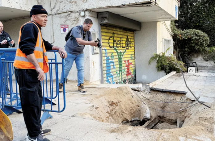A crater in Tel Aviv formed by an Iranian missile strike, March 8, 2026.