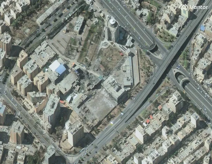 Damaged buildings following airstrikes in Iran.