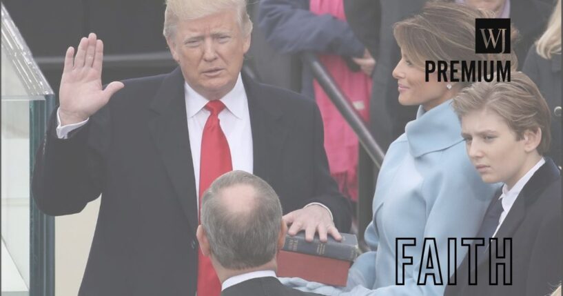 President Donald Trump is sworn in on Jan. 20, 2017, with his left hand on the Trump family Bible held by his wife Melania Trump and son Barron Trump looks on.