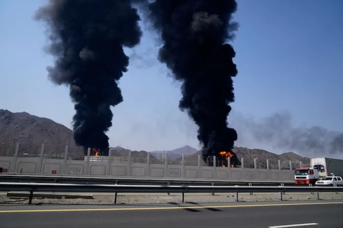 Fires and plumes of smoke rise in the United Arab Emirates.