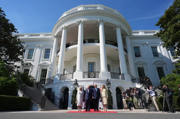 President Donald Trump and first lady Melania Trump greet Britain's King Charles III and Queen Camilla as they arrive at the White House, Monday, April 27, 2026, in Washington.
