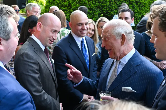 Britain's King Charles III talks with White House Deputy Chief of Staff Stephen Miller during a garden party at the British Embassy in Washington on April 27, 2026.