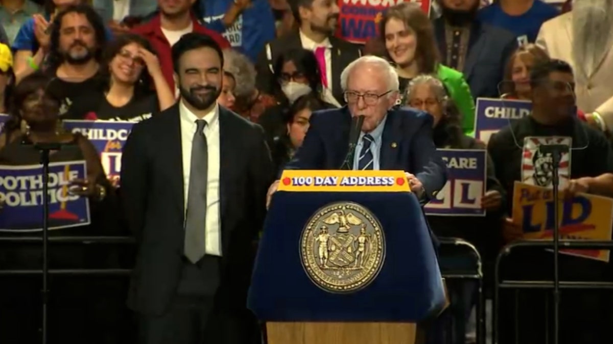 bernie sanders speaking at podium