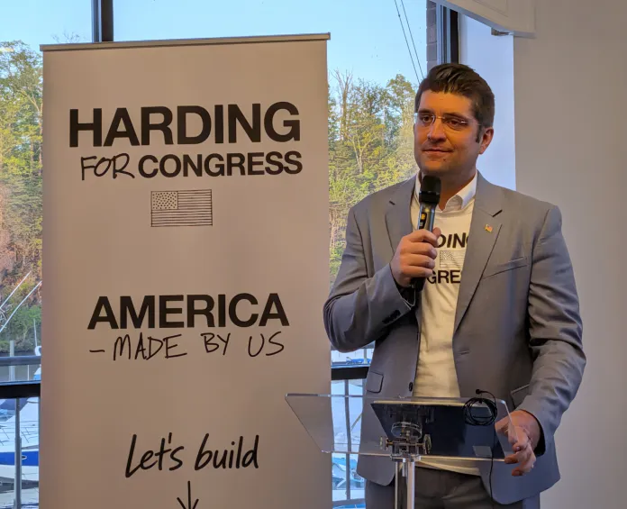 Man speaking into a microphone