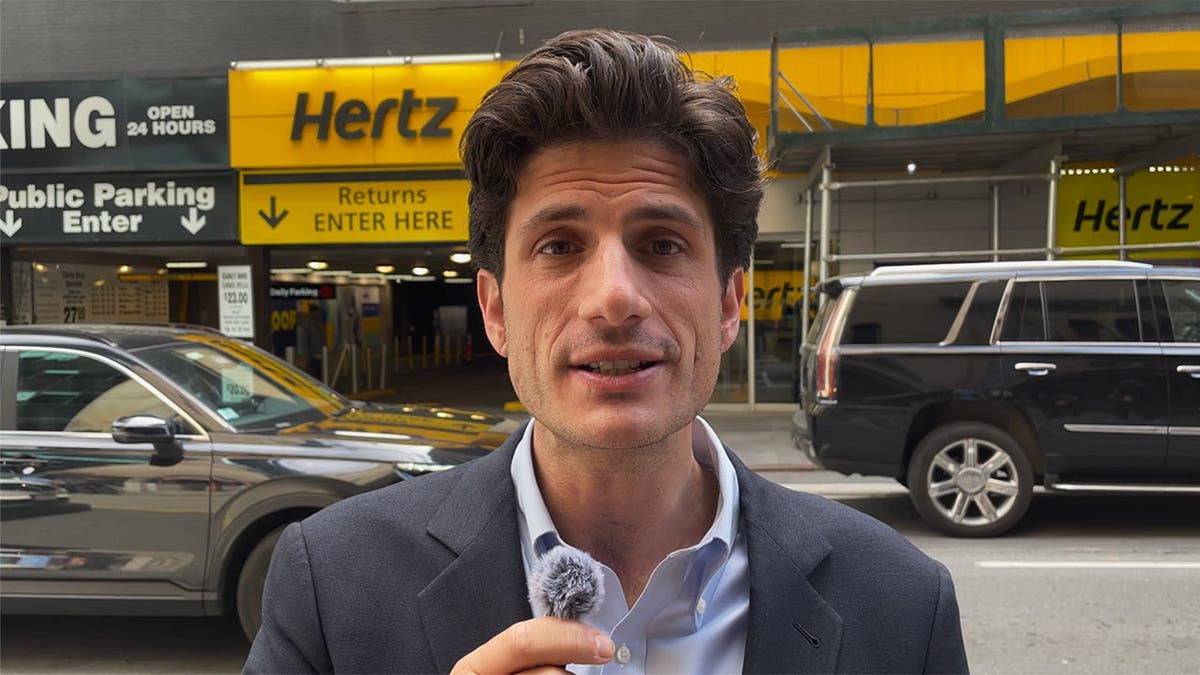 Jack Schlossberg speaking outside Hertz location