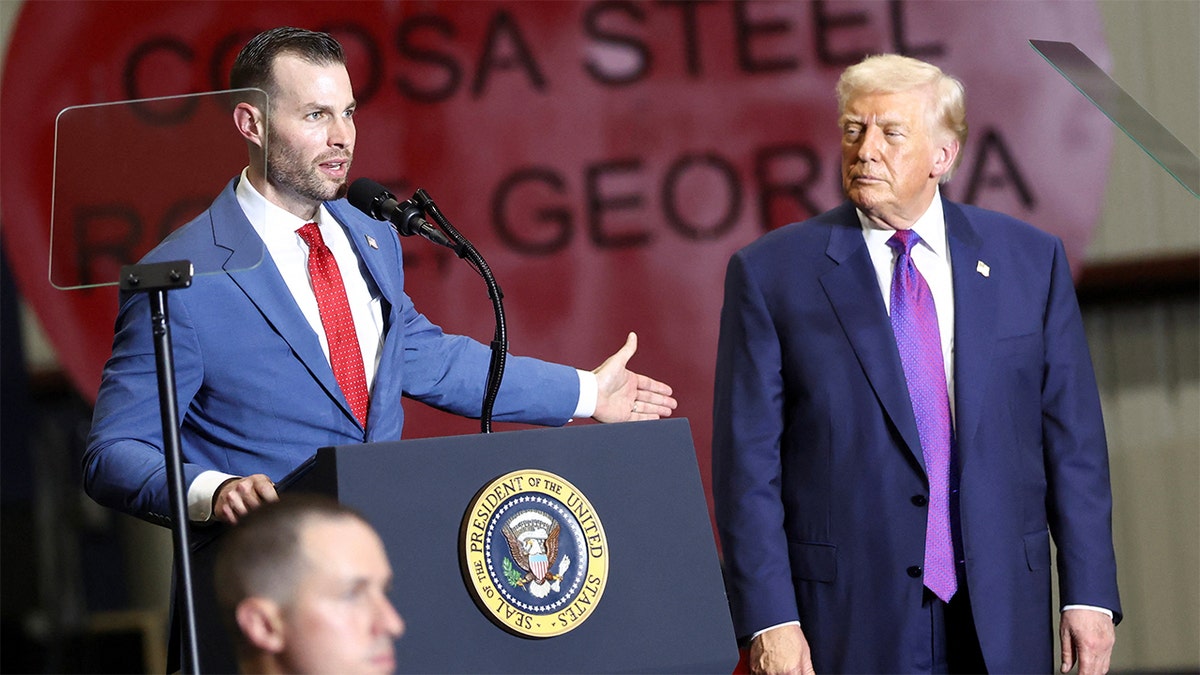 Republican congressional candidate Clay Fuller speaking next to President Donald Trump at Coosa Steel Corporation in Rome, Georgia