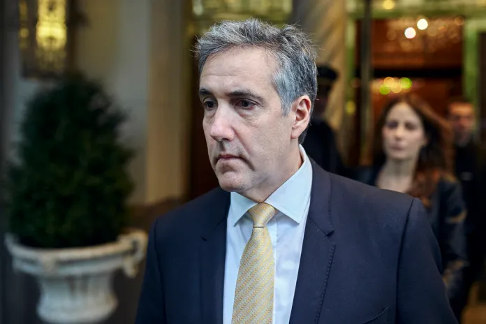 Michael Cohen departs his apartment building on his way to Manhattan criminal court