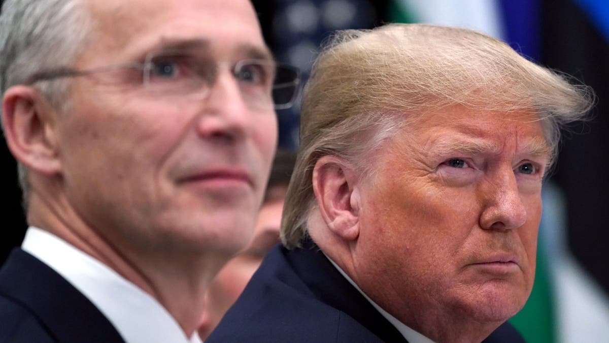 U.S. President Donald Trump and NATO Secretary General Jens Stoltenberg seated at a table during a working lunch