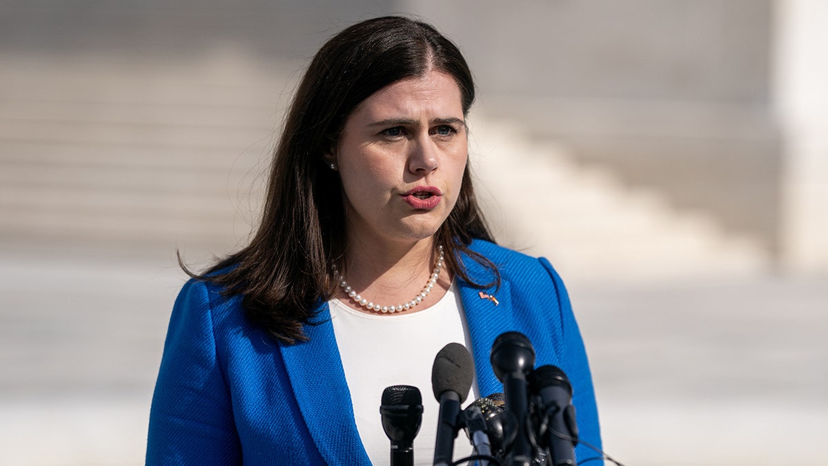 Jena Griswold speaking to media outside the US Supreme Court in Washington, D.C.