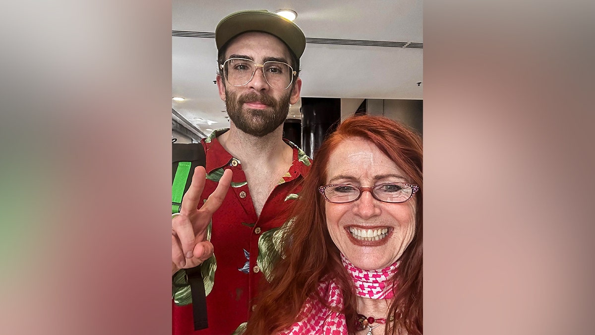 Hasan Piker and Jodie Evans standing together in Havana, Cuba
