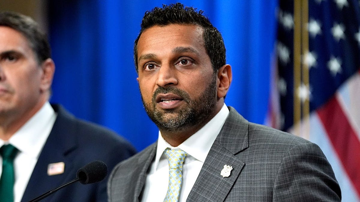 Acting Attorney General Todd Blanche and FBI Director Kash Patel speaking at a news conference