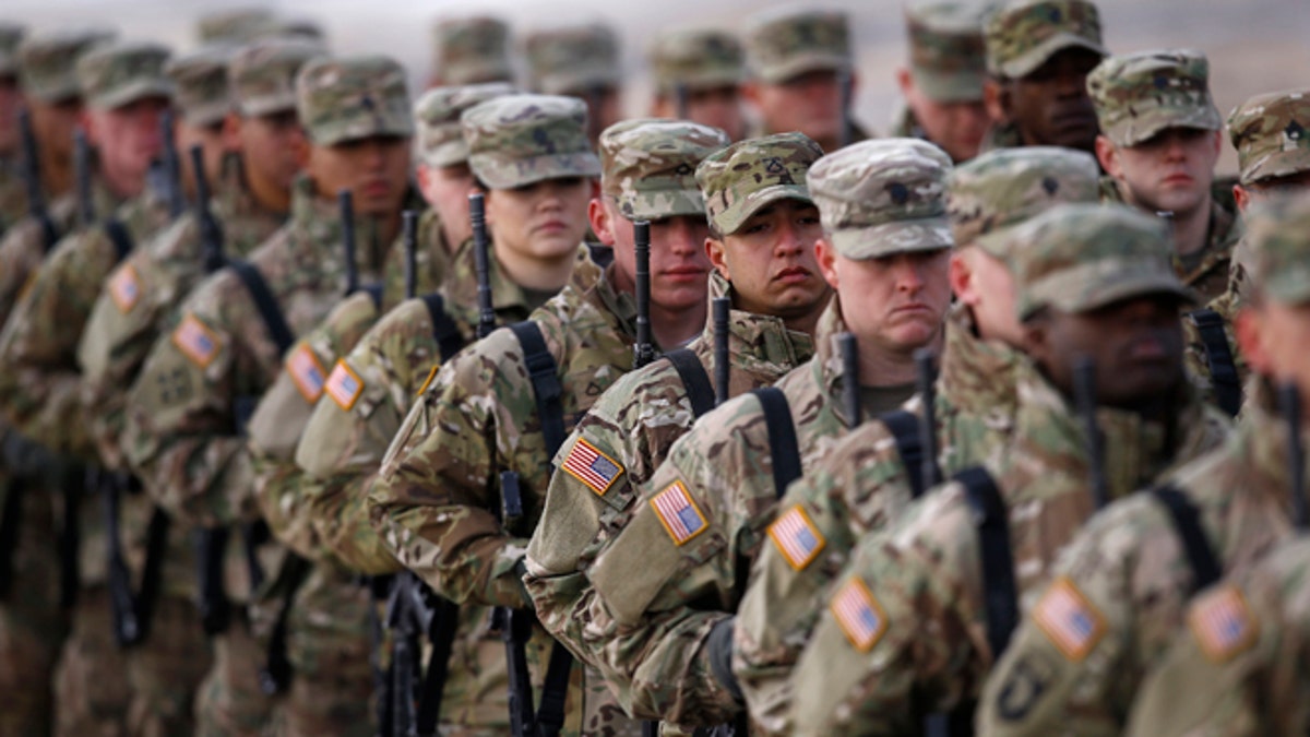 U.S. soldiers attend the inauguration ceremony of bilateral military training between U.S. and Polish troops in Zagan, Poland, January 30, 2017. REUTERS/Kacper Pempel - RTSY23N