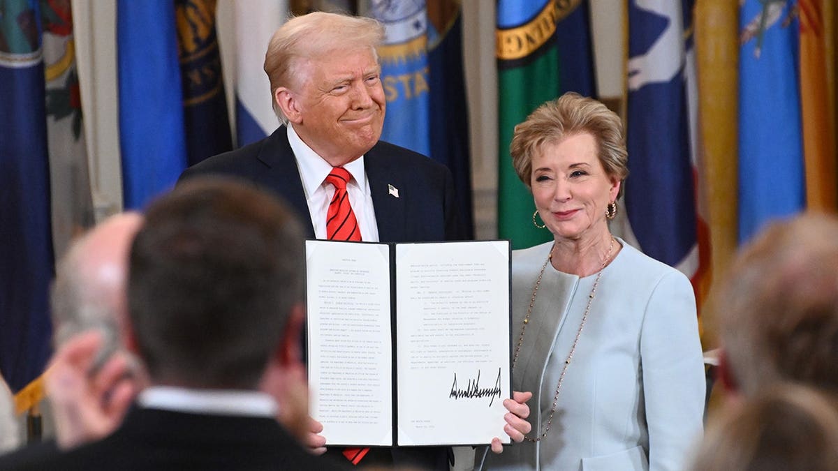 President Donald Trump and Education Secretary Linda McMahon