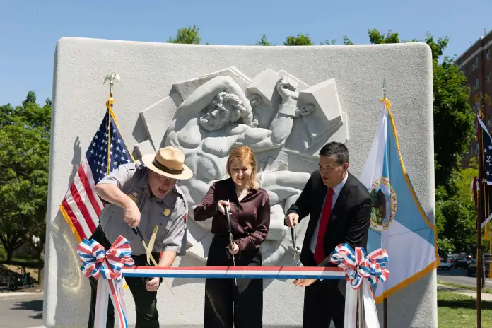 National Park Service officials celebrate the refurbishment of the Taras Schevchenko memorial in Northwest Washington D.C.