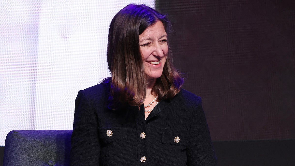 Rep. Elaine Luria speaking onstage at the Ripple of Hope Gala in New York City