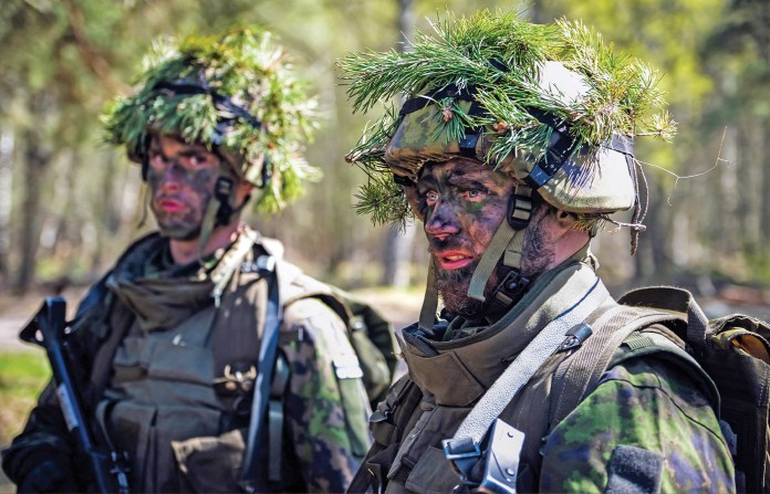 Civilian volunteers during a weekend with the National Defence Training Association of Finland at a military base in Helsinki, Finland, May 14, 2022. (Alessandro Rampazzo / Bloomberg / Getty Images)