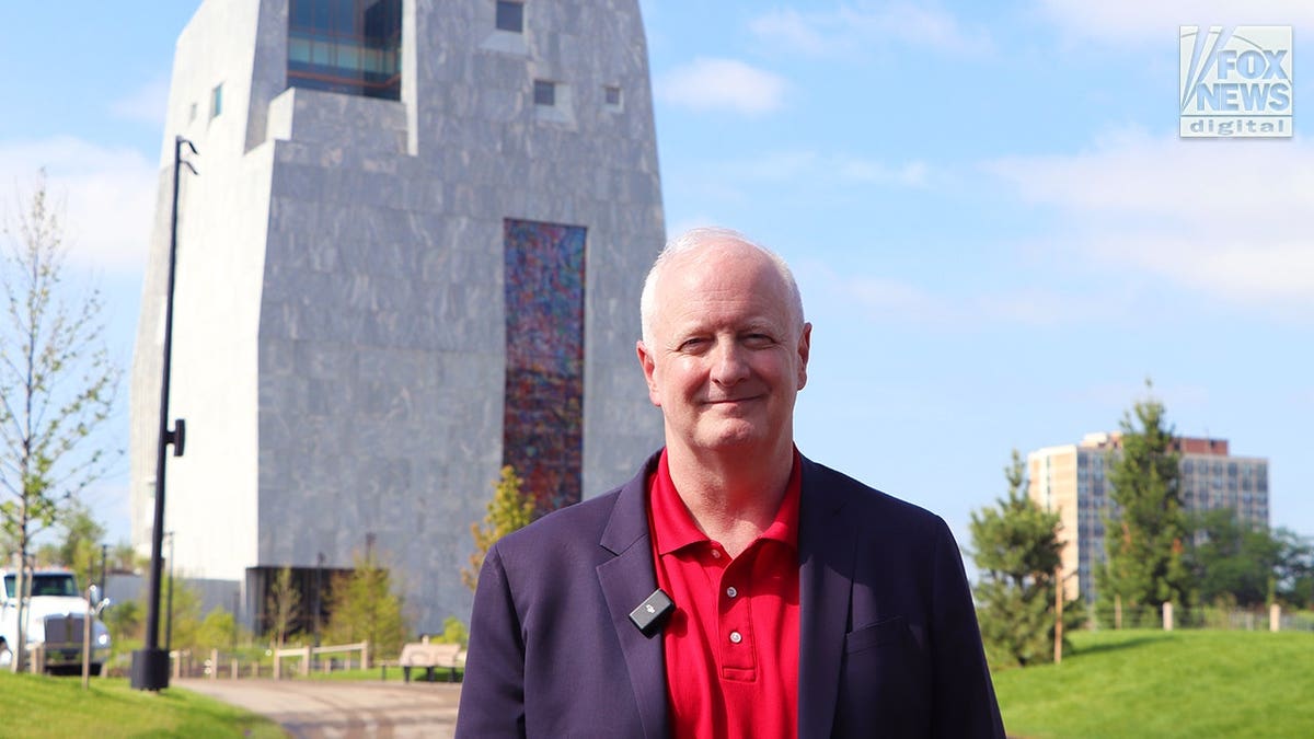 llinois GOP Chair Robert Grogan standing in front of the Obama Presidential Center in Chicago.