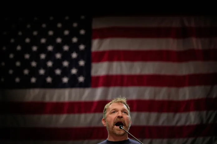 Graham Platner, Democratic candidate for U.S. Senate, speaks at an event hosted by Sen. Bernie Sanders in Orono, Maine, Sunday, May 24, 2026.
