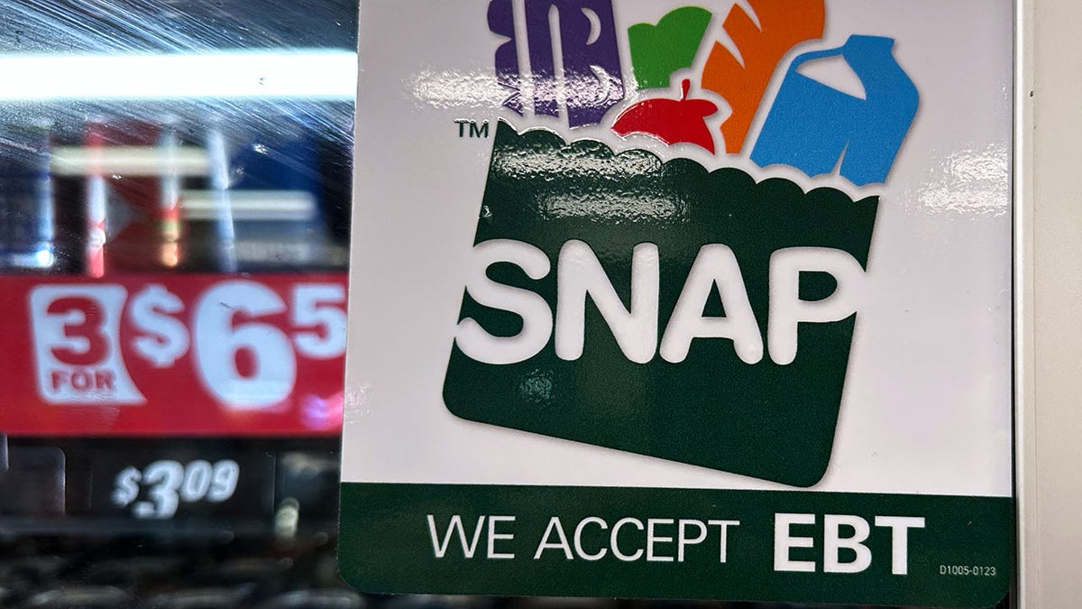 SNAP EBT information sign displayed at a gas station in Riverwoods, Illinois