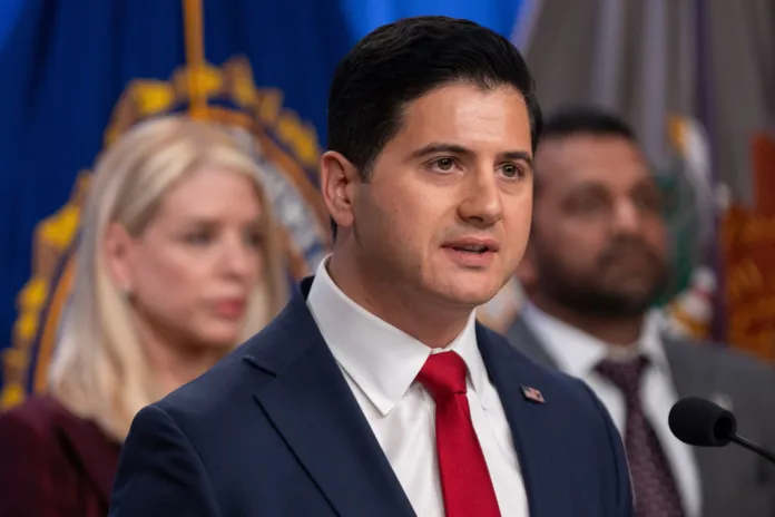 Bill Essayli, acting U.S. Attorney for the Central District of California, speaks with reporters.