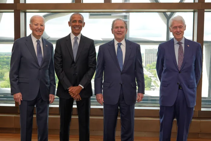 Former presidents pose for a photo as the obama presidential center opening