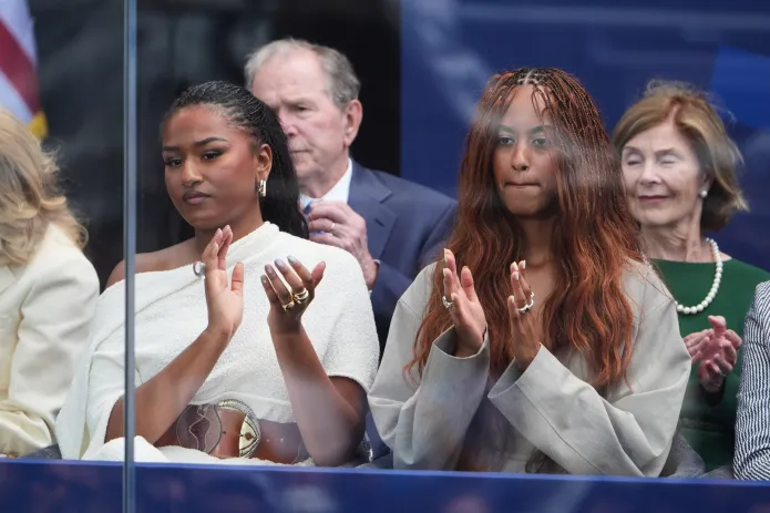 Malia and Sasha obama at the presidential library opening
