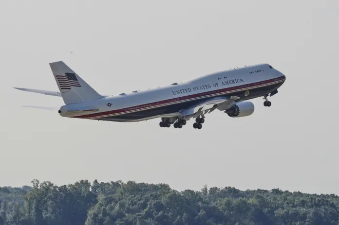 The newly designated Air Force One, left, with president Donald Trump on board, takes off at Joint Base Andrews, Md., Wednesday, July 1, 2026 (AP Photo/Luis M. Alvarez)