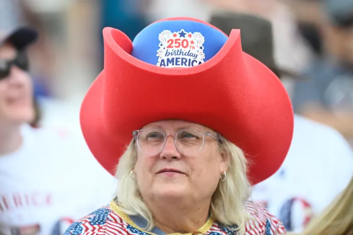 An attendee wears an America-themed hat at Mount Rushmore National Memorial, Friday, July 3, 2026, in Keystone, S.D.