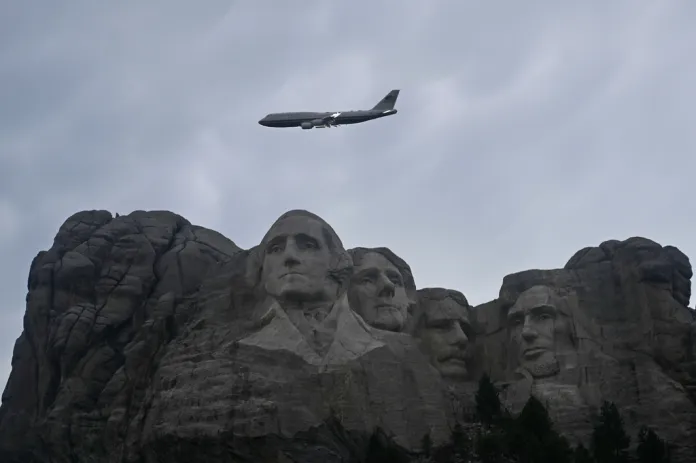 Air Force One performs a flyover at Mount Rushmore National Memorial, Friday, July 3, 2026, in Keystone, S.D.