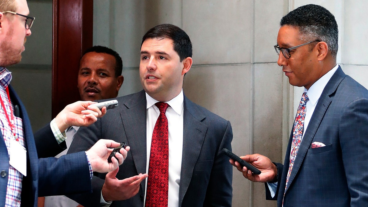 San Francisco 49er's owner Jed York talks with reporters as he leaves the NFL owner's spring meeting Wednesday, May 23, 2018, in Atlanta. York abstained from voting on the NFL's new national anthem policy. (AP Photo/John Bazemore)