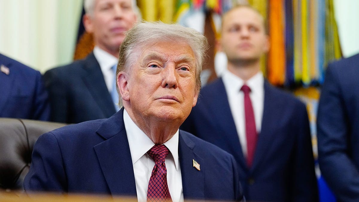 President Donald Trump speaks during an announcement in the Oval Office.