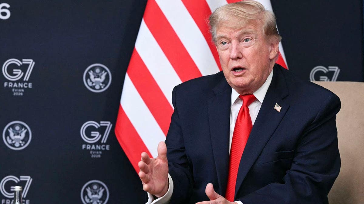US President Donald Trump delivering remarks at a bilateral meeting during the G7 summit in Evian, France