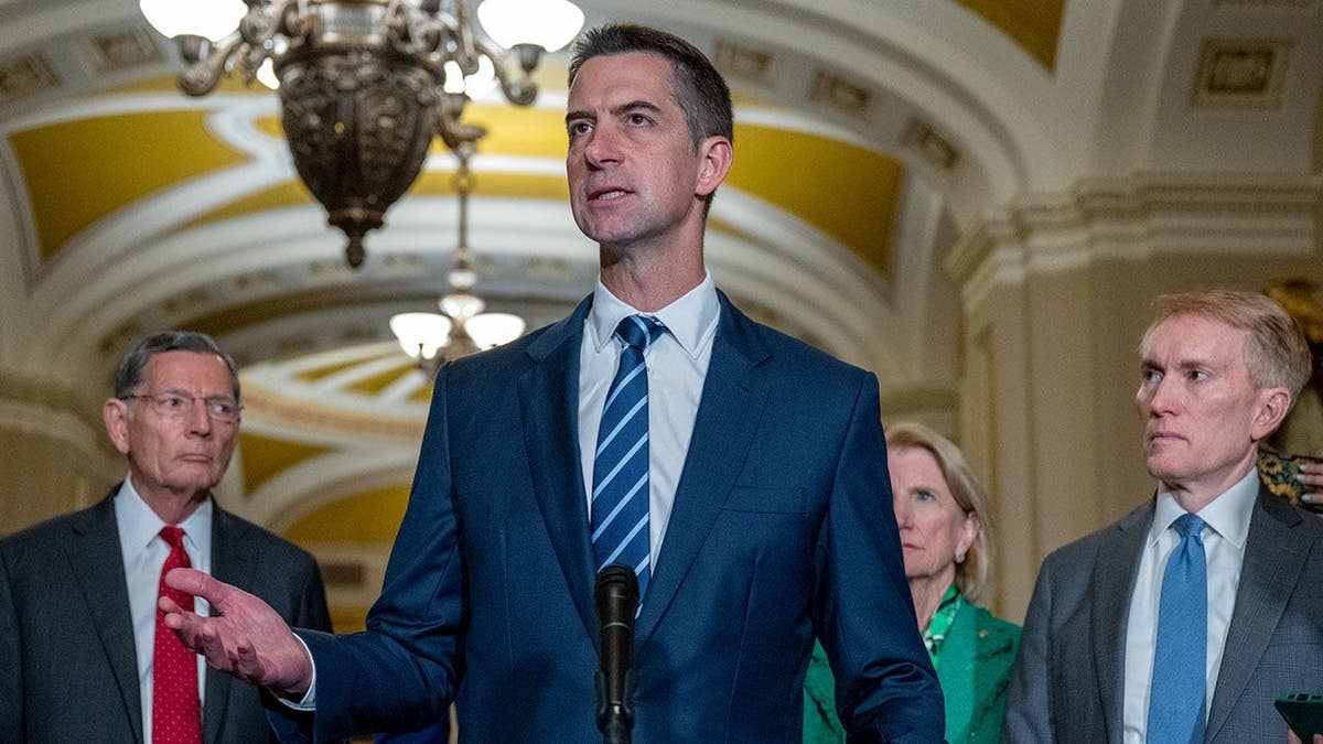 Senators John Barrasso, Tom Cotton, Shelley Moore Capito and James Lankford stand at a news conference podium.