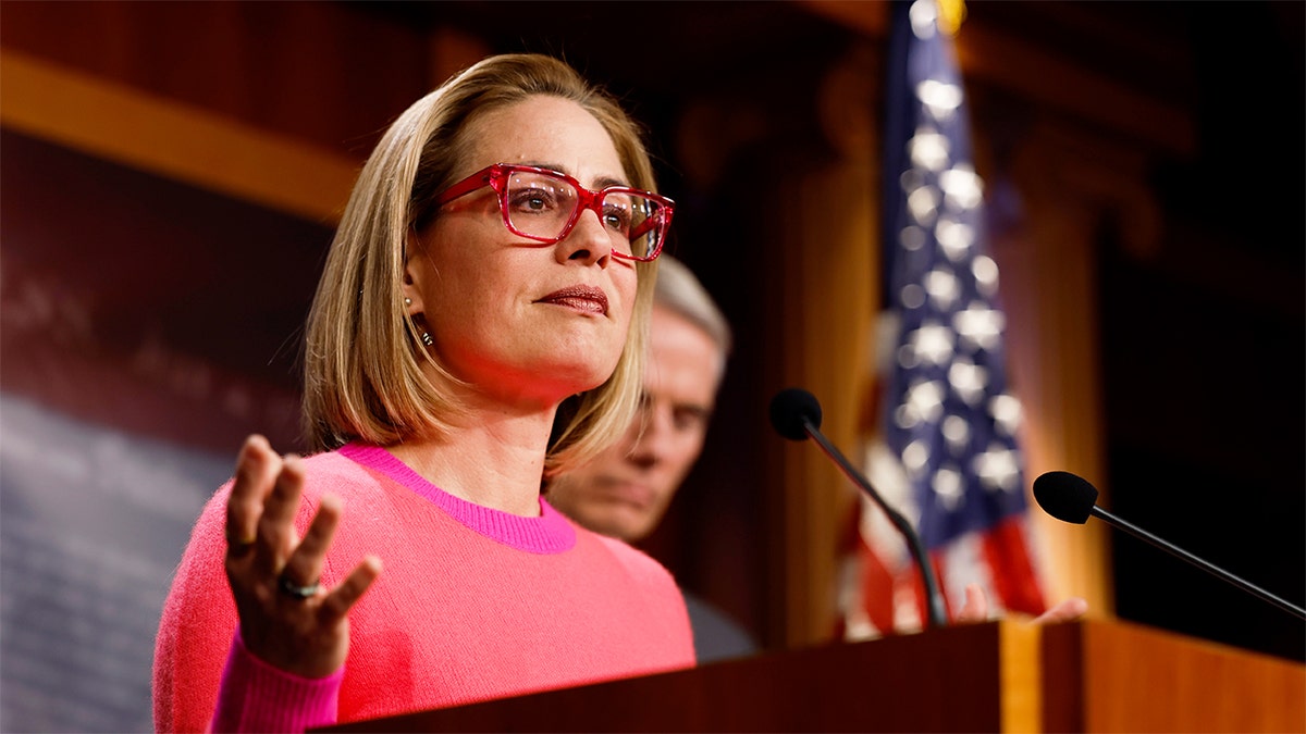WASHINGTON, DC - NOVEMBER 29: U.S. Sen. Kyrtsen Sinema (D-AZ) speaks at a news conference after the Senate passed the Respect for Marriage Act at the Capitol Building on November 29, 2022 in Washington, DC. In a 61-36 vote, the measure would provide federal recognition and protection for same-sex and interracial marriages. (Photo by Anna Moneymaker/Getty Images)