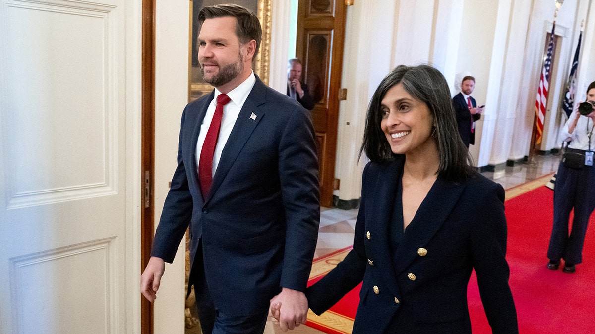 Vice President JD Vance holding hands with his wife Usha