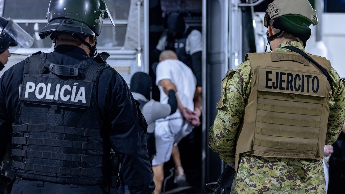 17 members of Venezuela's Tren de Aragua gang and members of the MS-13 gang, who were deported to El Salvador by the US in San Salvador, El Salvador on March 31, 2025. El Salvador's President Nayib Bukele confirmed they will be sent to the country's infamous mega-prison at CECOP facility prison. San Salvador forces took heavy security measures. (Photo by El Salvador Press Presidency Office/Anadolu via Getty Images)