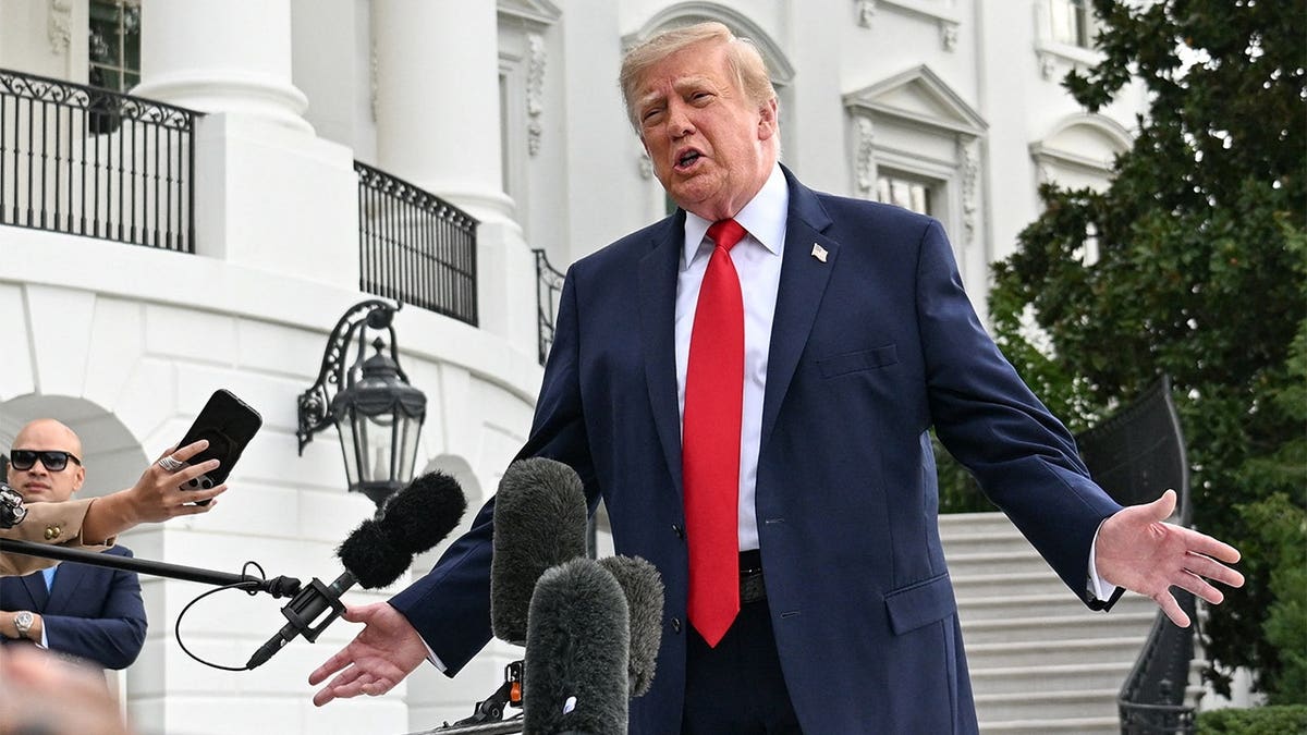 U.S. President Donald Trump speaks to the media as he departs the White House on the South Lawn in Washington, DC, US, September 26, 2026.