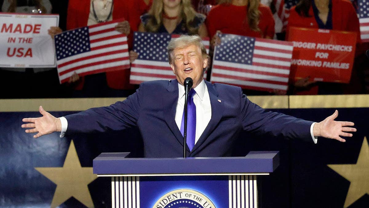 President Donald Trump speaks at a podium during the Republican convention at American Airlines Center.