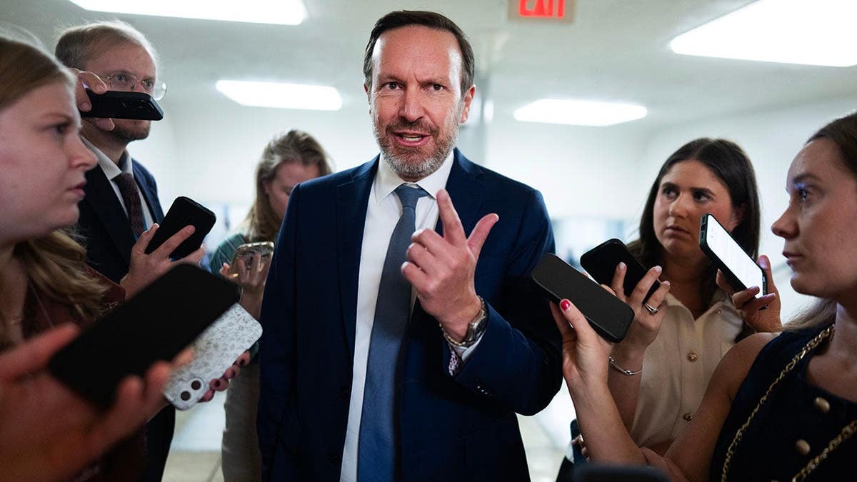Sen. Chris Murphy speaks with reporters in the U.S. Capitol.