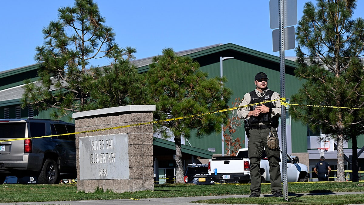Police tape is placed outside Silver Rail Elementary school, where a shooting took place, on Thursday, Oct. 15, 2026 in Bend, Ore.