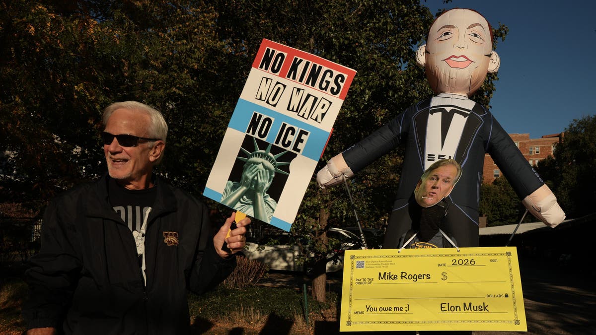 Protesters outside U.S. Senate debate in Michigan