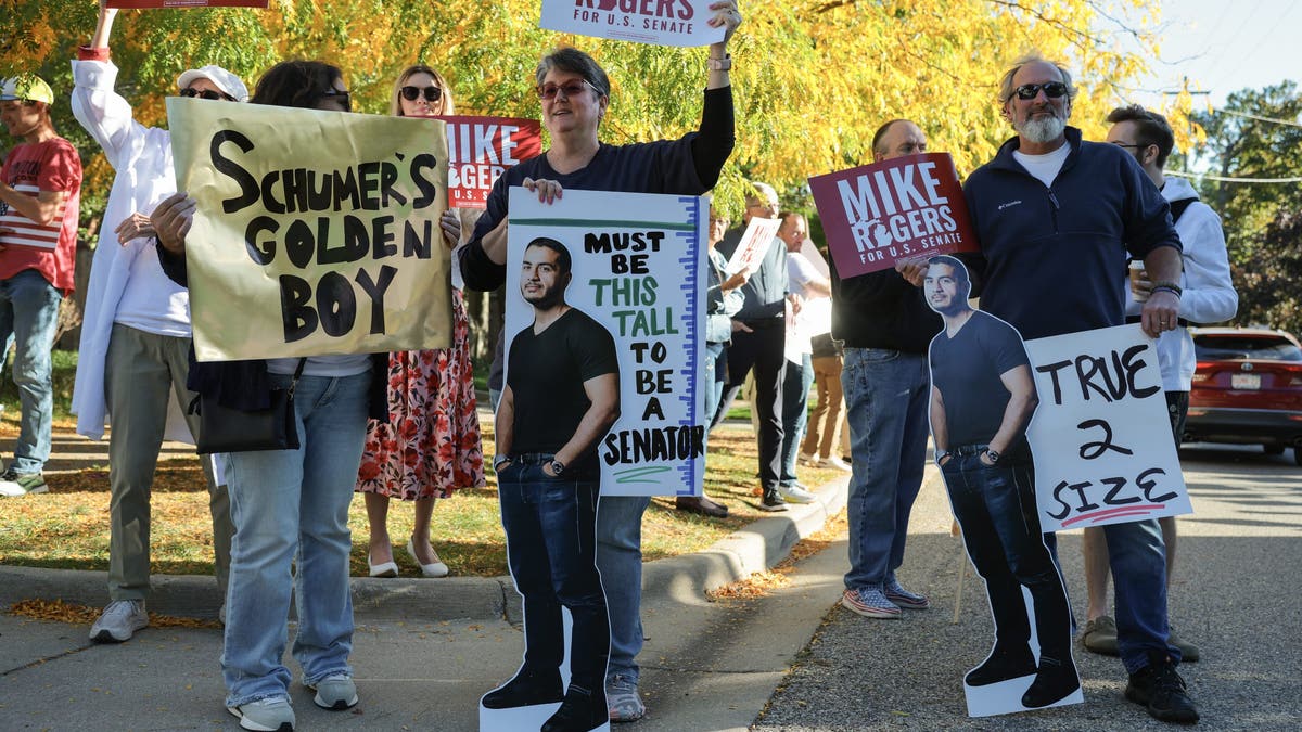 Protesters outside U.S. Senate debate in Michigan
