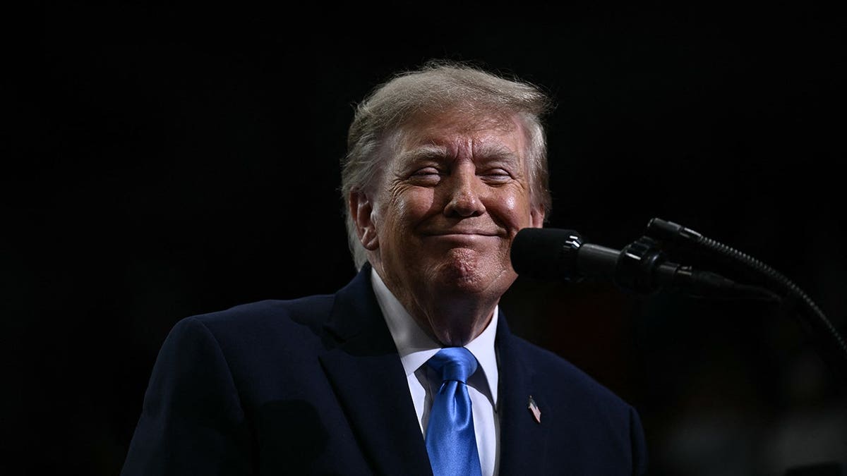 Donald Trump smiles during a campaign rally in Vandalia, Ohio.